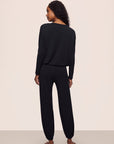 Model is wearing Gisele TENCEL™ Modal Slouchy PJ Set in Black/Ivory
