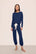 Model is wearing Gisele TENCEL™ Modal Slouchy PJ Set in Navy/Ivory