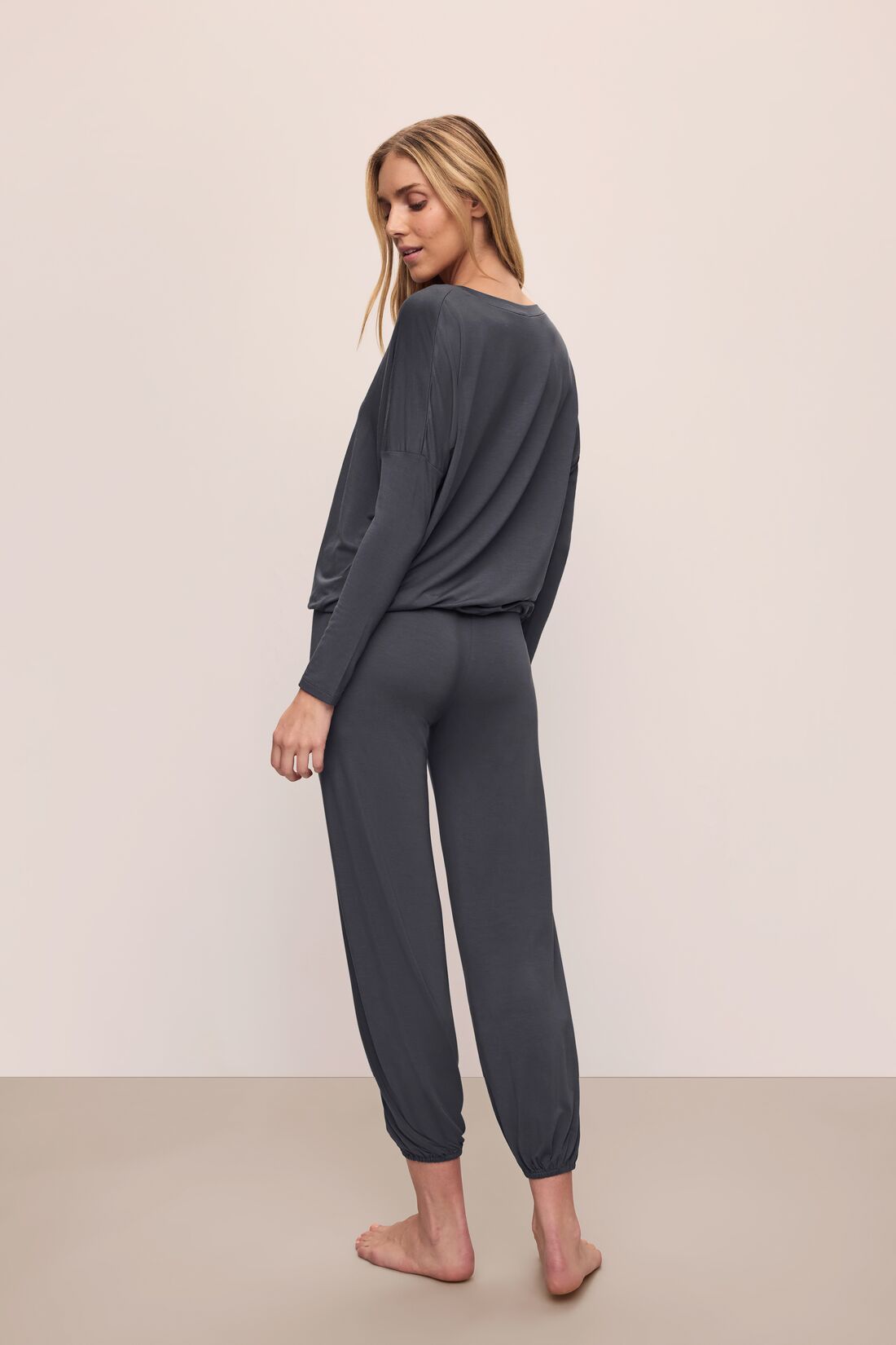 Model wears Gisele TENCEL™ Modal Slouchy PJ Set in Graphite/Ivory.