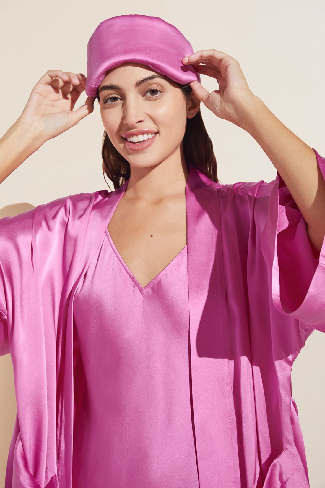 Model wears Inez Washable Silk Eye Mask in Italian Rose.
