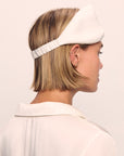 Model is wearing Washable Silk Eye Mask in Ivory