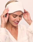 Model is wearing Washable Silk Eye Mask in Ivory