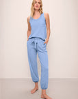 Model wears the Aloe Cotton Pant in Wedgewood Blue.