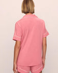Model is wearing Gisele TENCEL™ Modal Relaxed Short PJ Set in Sunkissed Coral/Ivory