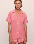 Model is wearing Gisele TENCEL™ Modal Relaxed Short PJ Set in Sunkissed Coral/Ivory