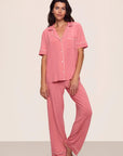 Model is wearing Gisele TENCEL™ Modal Short Sleeve & Pant PJ Set in Sunkissed Coral/Ivory