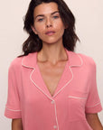 Model is wearing Gisele TENCEL™ Modal Short Sleeve & Pant PJ Set in Sunkissed Coral/Ivory