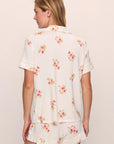 Model is wearing Gisele Printed TENCEL™ Modal Relaxed Short PJ Set in Floral Bloom Ivy/Vanilla Cream
