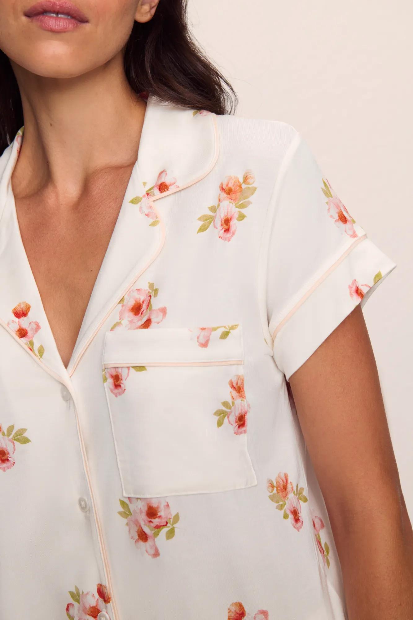 Model is wearing Gisele Printed TENCEL™ Modal Short Sleeve Cropped PJ Set in  Floral Bloom Ivy/Vanilla Cream