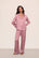 Model is wearing Inez Washable Silk Long PJ Set in  Lilas/Ivory