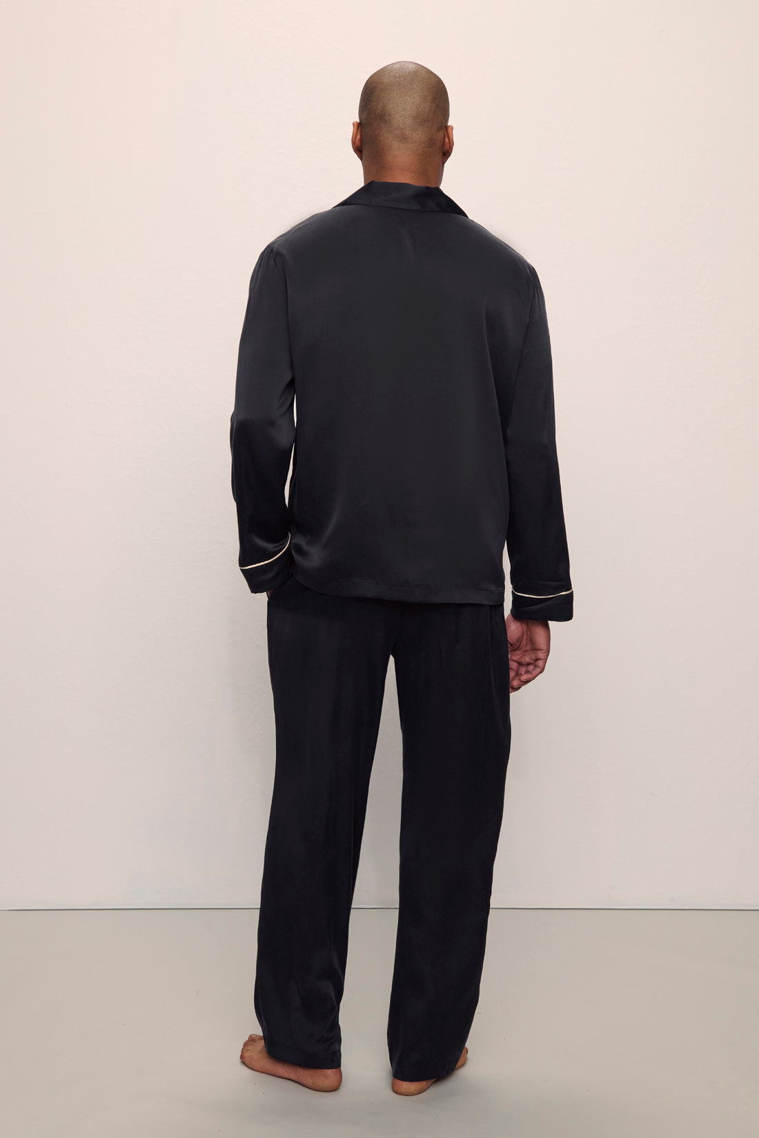 Model is wearing Charles Washable Silk Long PJ Set in Black/Champagne