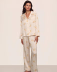 Model is wearing Inez Washable Silk Printed Long PJ Set in Floral Bloom Peach Dust/Ivory
