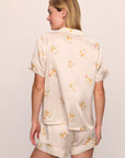 Model is wearing Inez Washable Silk Printed Short PJ Set in Floral Bloom Peach Dust/Ivory