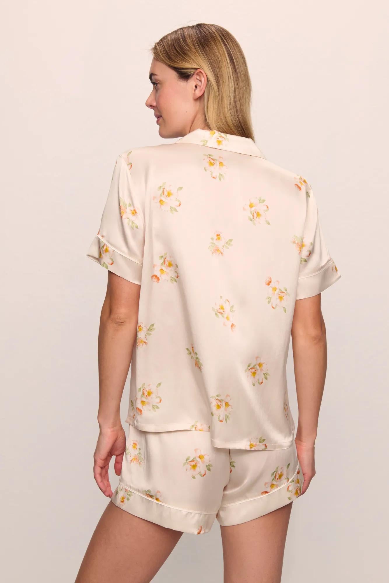 Model is wearing Inez Washable Silk Printed Short PJ Set in  Floral Bloom Peach Dust/Ivory