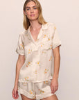 Model is wearing Inez Washable Silk Printed Short PJ Set in Floral Bloom Peach Dust/Ivory