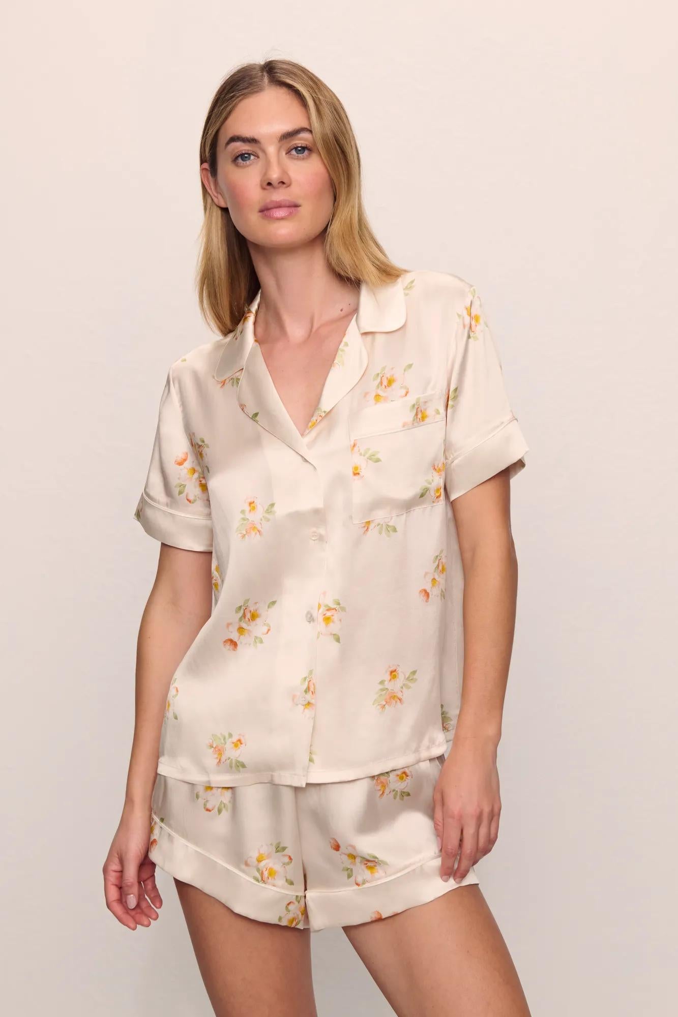 Model is wearing Inez Washable Silk Printed Short PJ Set in  Floral Bloom Peach Dust/Ivory