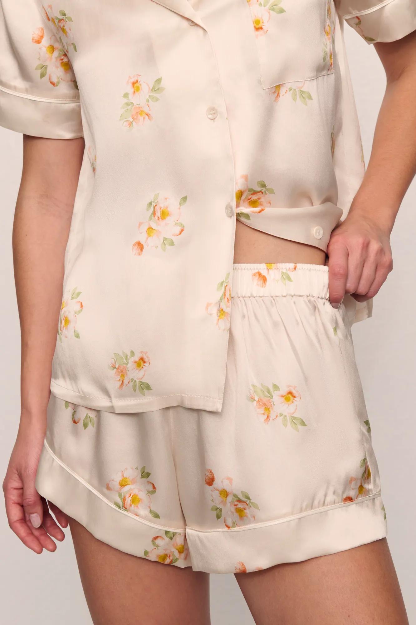 Model is wearing Inez Washable Silk Printed Short PJ Set in  Floral Bloom Peach Dust/Ivory