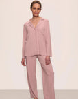 Model is wearing Gisele TENCEL™ Modal Rib Long PJ Set in Pale Mauve