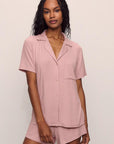Model is wearing Gisele TENCEL™ Modal Rib Relaxed Short PJ Set in Pale Mauve