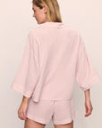 Model is wearing Nautico Relaxed Short PJ Set in Feeder Stripes Pale Mauve/White