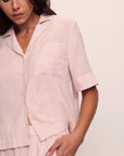 Model is wearing Nautico Relaxed Short Sleeve & Pant PJ Set in Feeder Stripespale Mauve/White