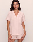 Model is wearing Nautico Shortie Short PJ Set in Feeder Stripespale Mauve/White