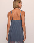 Model is wearing Georgina TENCEL™ Modal Slip in Peppercorn