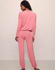 Model is wearing Gisele TENCEL™ Modal Slouchy PJ Set in Sunkissed Coral/Ivory