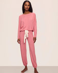 Model is wearing Gisele TENCEL™ Modal Slouchy PJ Set in Sunkissed Coral/Ivory