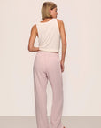 Model is wearing Nautico Boxer Pant in Feeder Stripespale Mauve/White